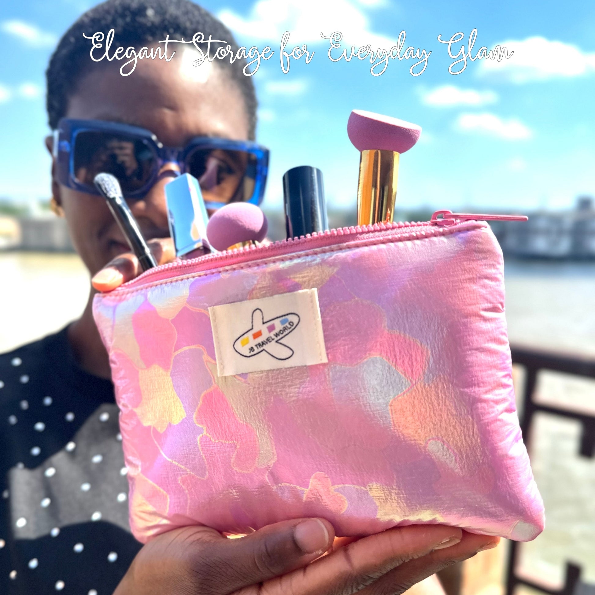 Pink shimmer cosmetic bag showing makeup items inside – handmade iridescent bag