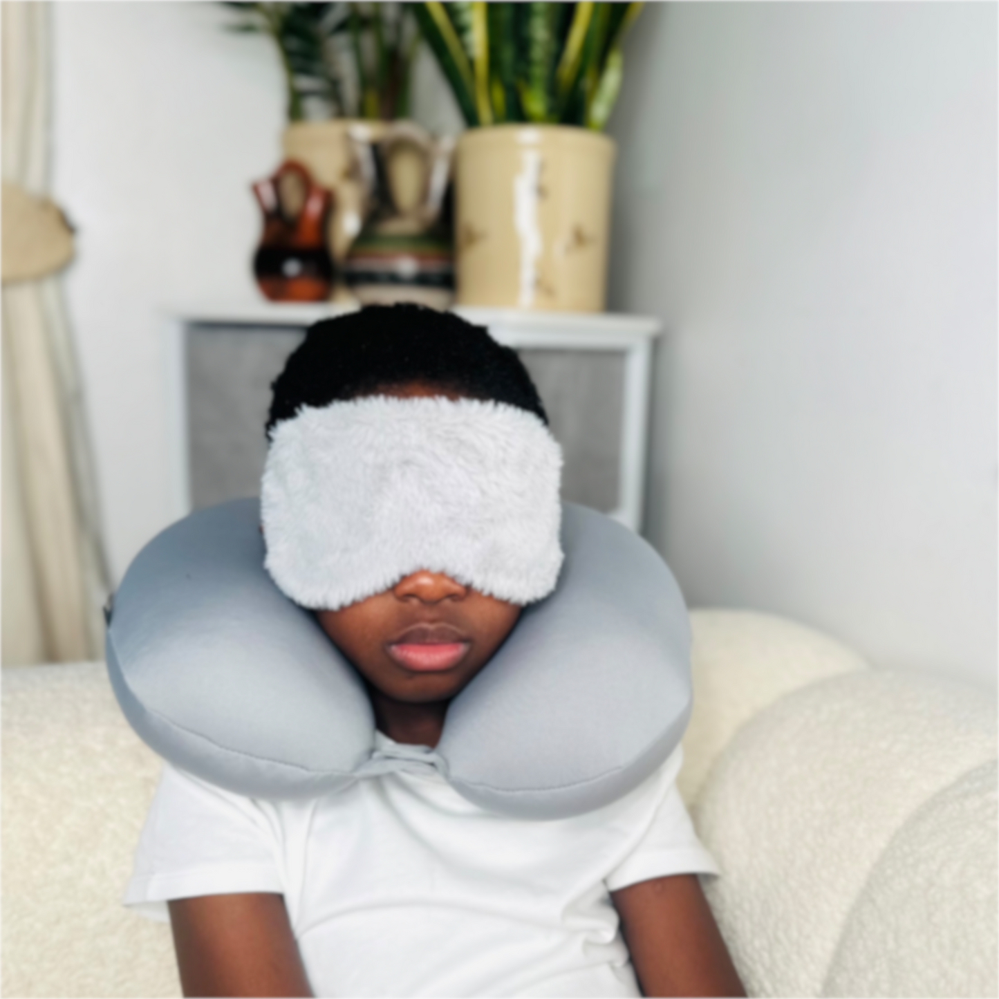 Soft and fluffy eye mask for comfort during travel or sleep, perfect for blocking out light.