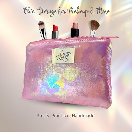 Pink shimmer makeup bag shown open with cosmetics – soft-lined interior ideal for beauty essentials.